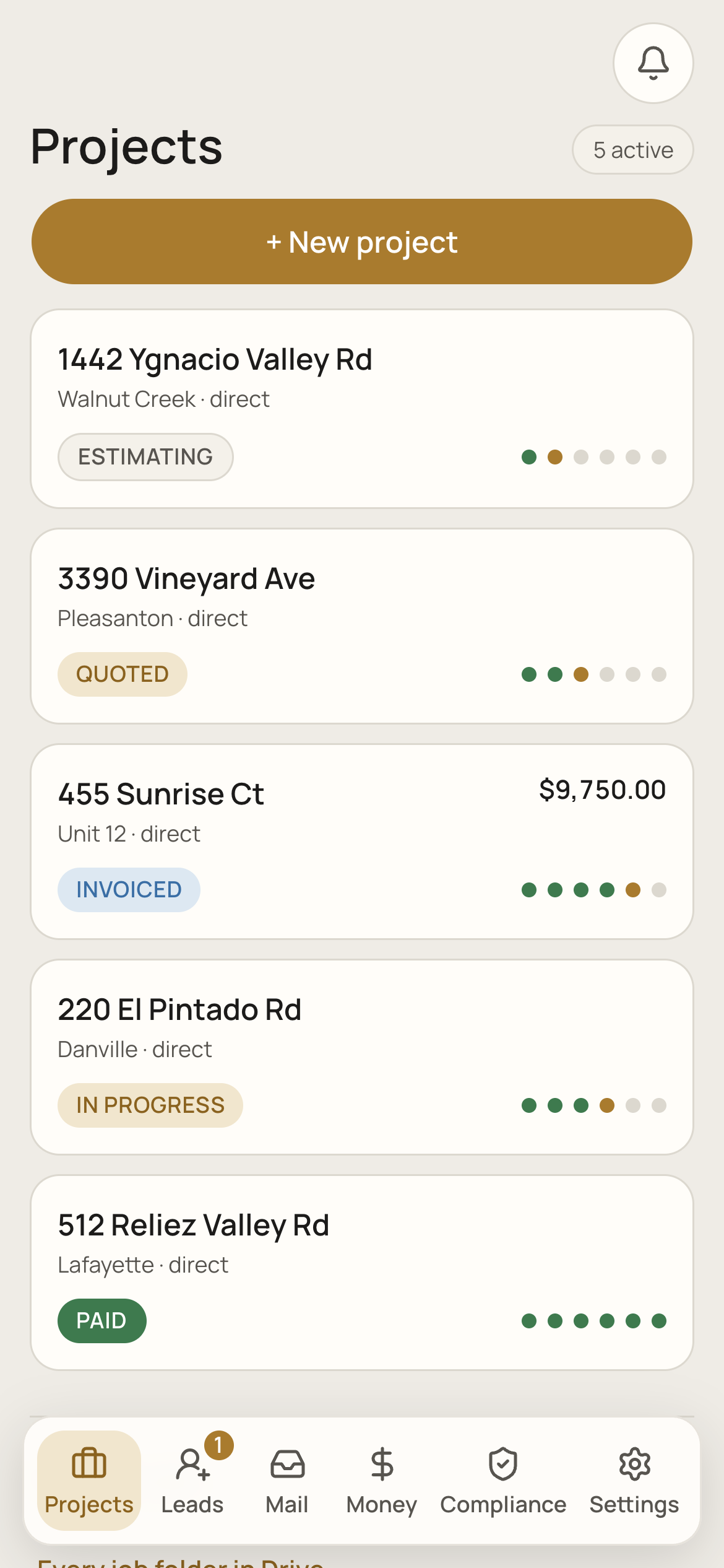 The job list on a phone, each job with a status pill.